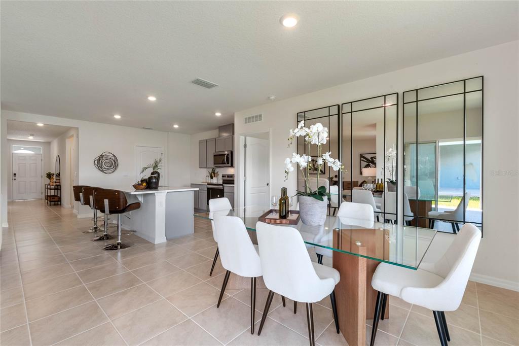 3503 Nettle Loop Tavares, FL 32778 - Photo 17 of 38 a view of a dining room with furniture