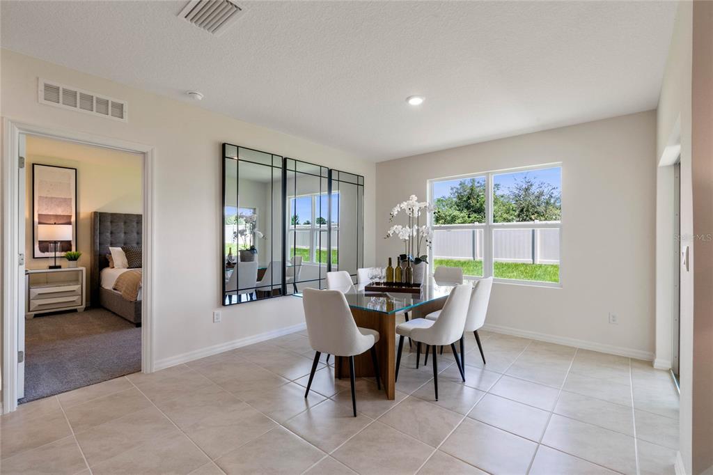3503 Nettle Loop Tavares, FL 32778 - Photo 18 of 38 a dining room with furniture and window