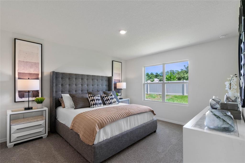 3503 Nettle Loop Tavares, FL 32778 - Photo 23 of 38 a bedroom with bed and a window