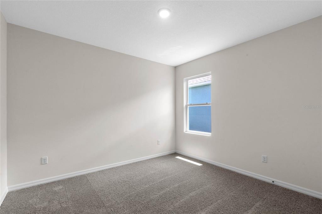 3503 Nettle Loop Tavares, FL 32778 - Photo 34 of 38 an empty room with a window and closet