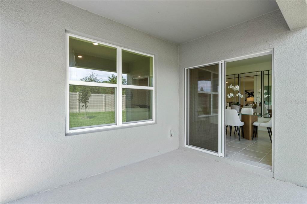 3503 Nettle Loop Tavares, FL 32778 - Photo 37 of 38 an empty room with windows and closet