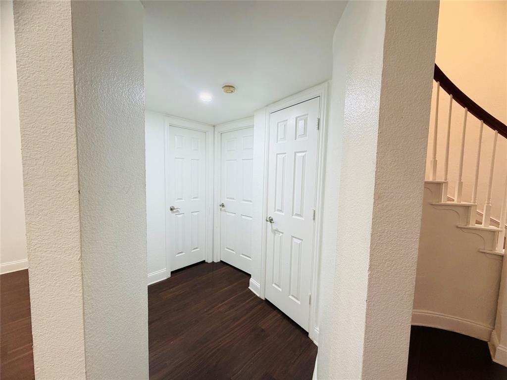 434 Moonlight Way Irving, TX 75063 - Photo 5 of 29 a view of a hallway with wooden floor