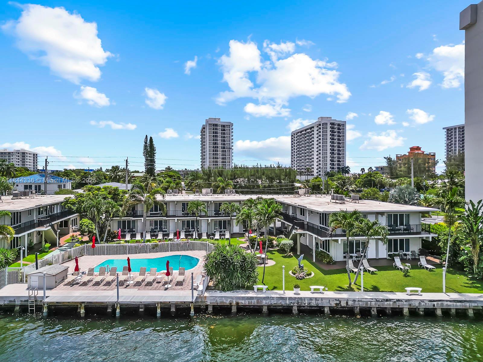 555 North Riverside Drive, Unit 4 Pompano Beach, FL 33062 - Photo 1 of 22 a view of a city with tall buildings