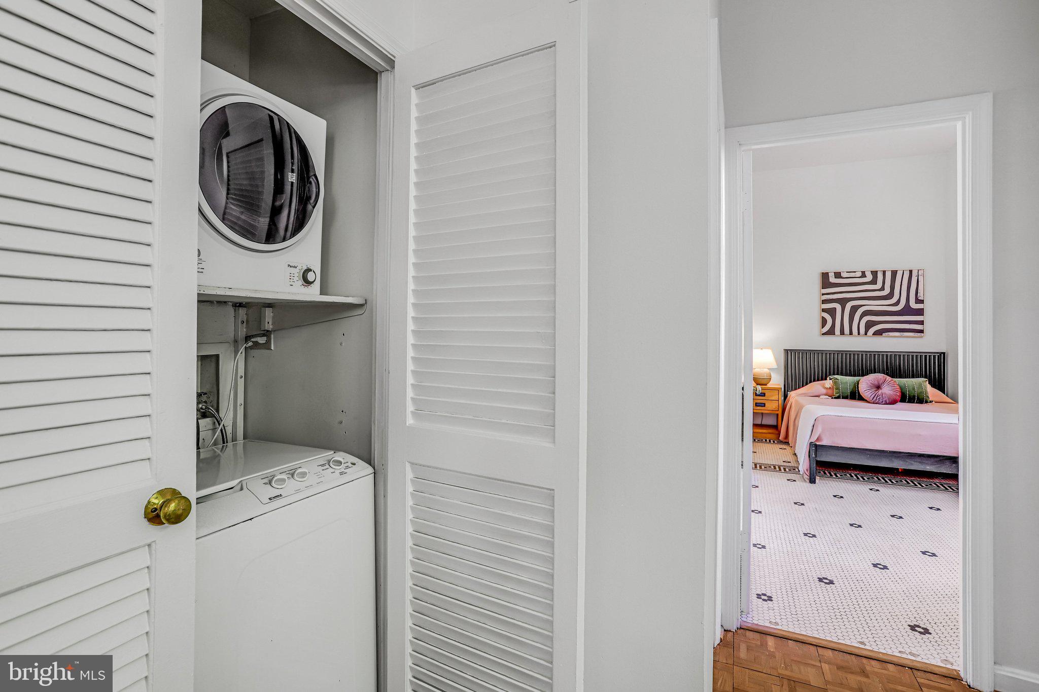 2001 16th Street Northwest, Unit 105 Washington, DC 20009 - Photo 13 of 16 a utility room with dryer and washer