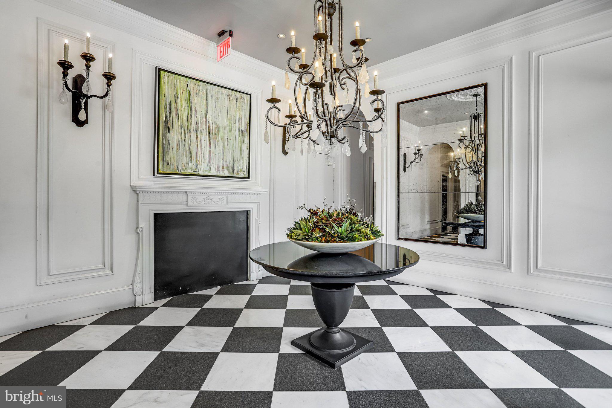 2001 16th Street Northwest, Unit 105 Washington, DC 20009 - Photo 15 of 16 a room with a black and white checkered floor with a black white checkered floor