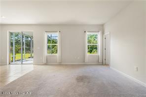 Undisclosed Address Vero Beach, FL 32967 - Photo 16 of 36 an empty room with windows and view
