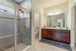 Undisclosed Address Vero Beach, FL 32967 - Photo 21 of 36 a bathroom with a sink and a mirror
