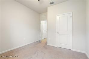 Undisclosed Address Vero Beach, FL 32967 - Photo 24 of 36 an empty room with closet area