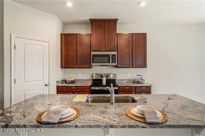 Undisclosed Address Vero Beach, FL 32967 - Photo 8 of 36 a living room with furniture and a wooden floor