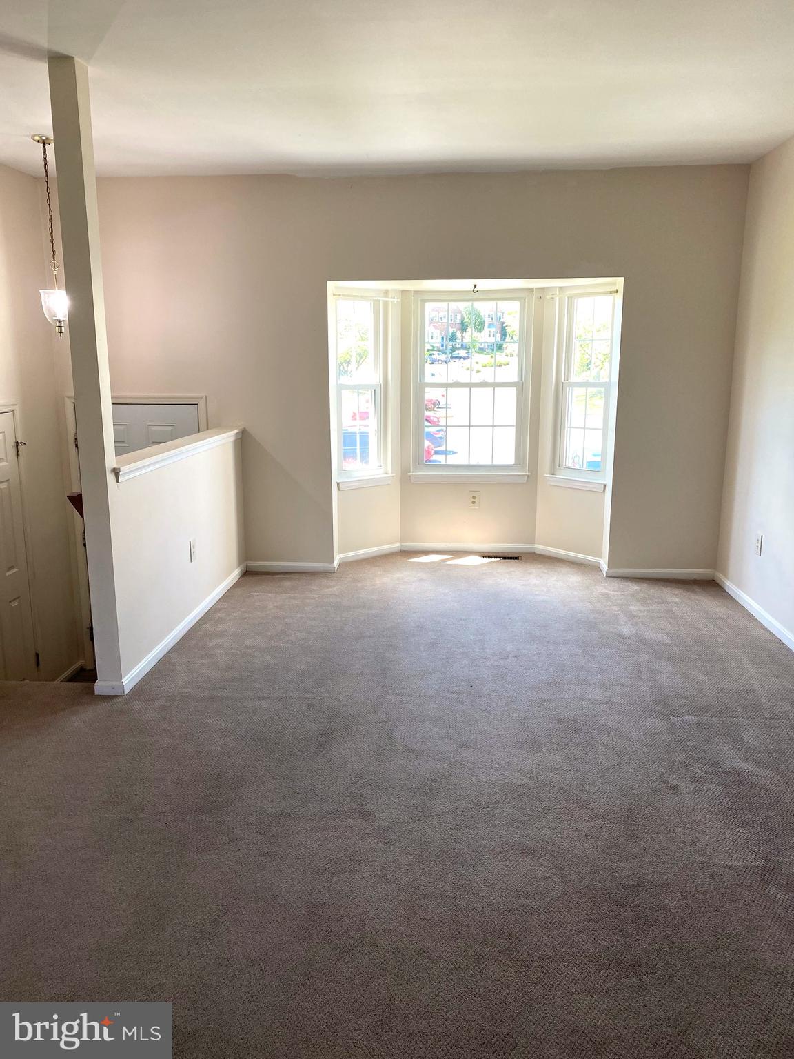 12339 Sandy Point Court Silver Spring, MD 20904 - Photo 2 of 19 a view of an empty room with a window