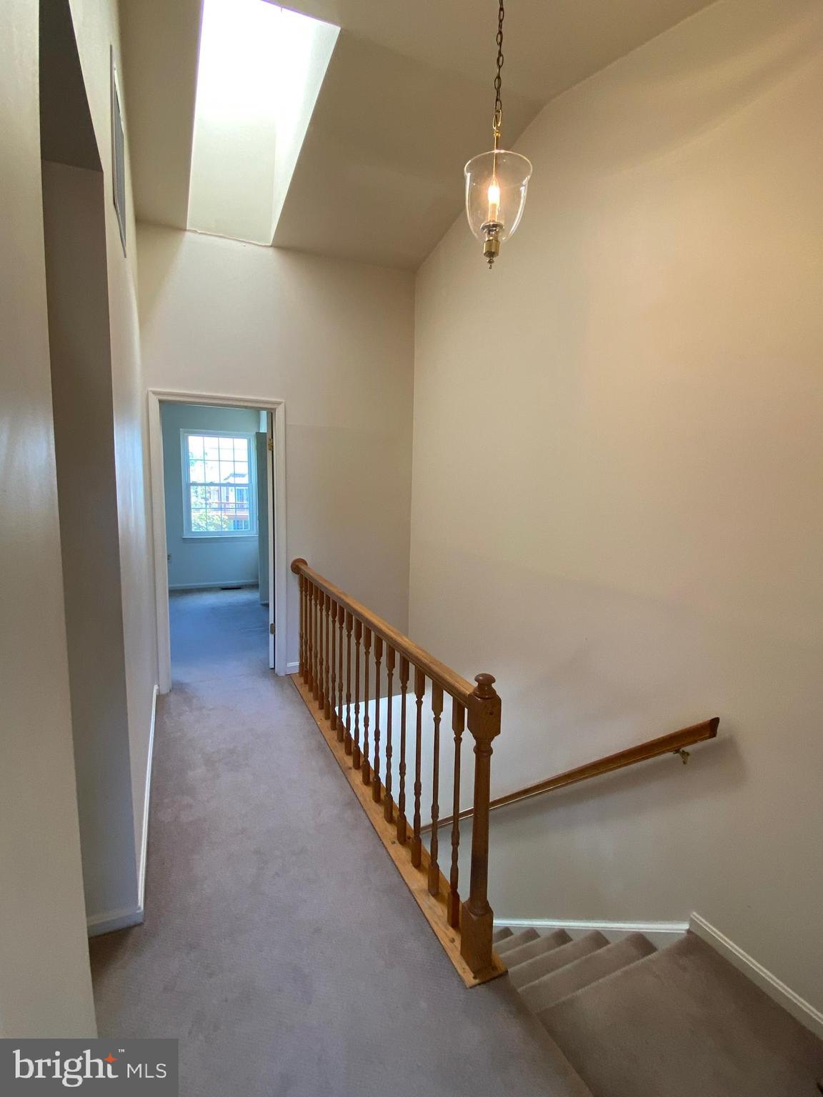 12339 Sandy Point Court Silver Spring, MD 20904 - Photo 10 of 19 a view of a hallway with windows