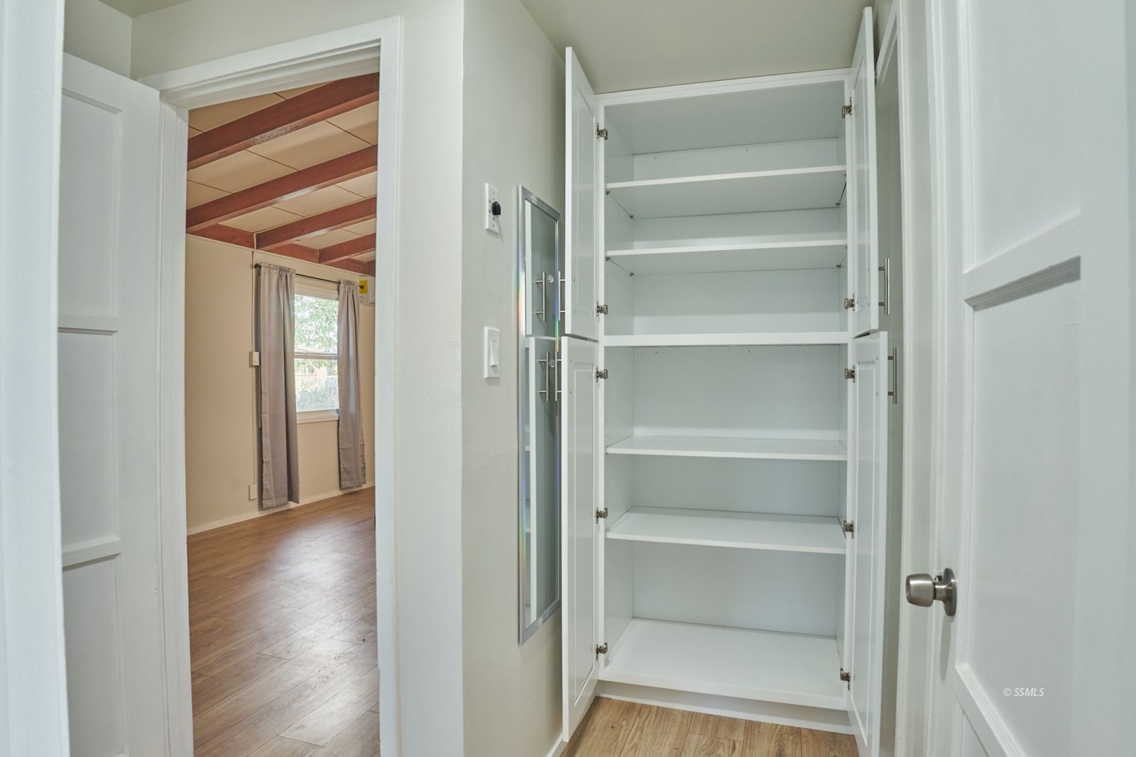 333 North Florence Street Ridgecrest, CA 93555 - Photo 16 of 30 a view of walk in closet with empty racks