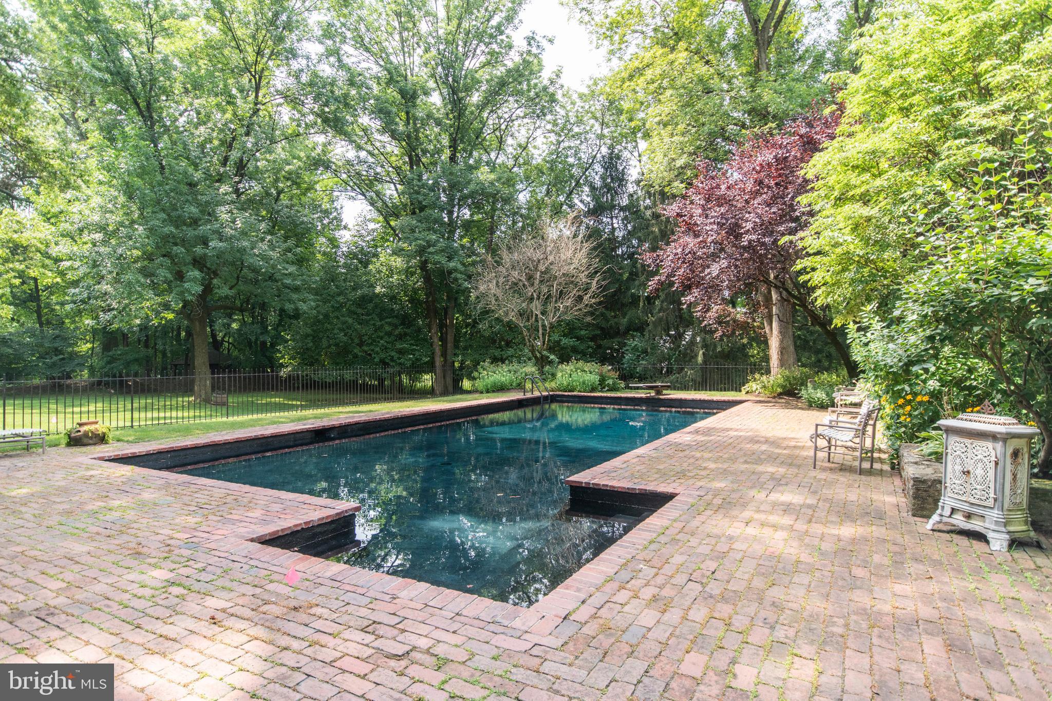 643 Washington Lane Rydal, PA 19046 - Photo 4 of 47 Sylvan pool set among recycled bricks from Phila.