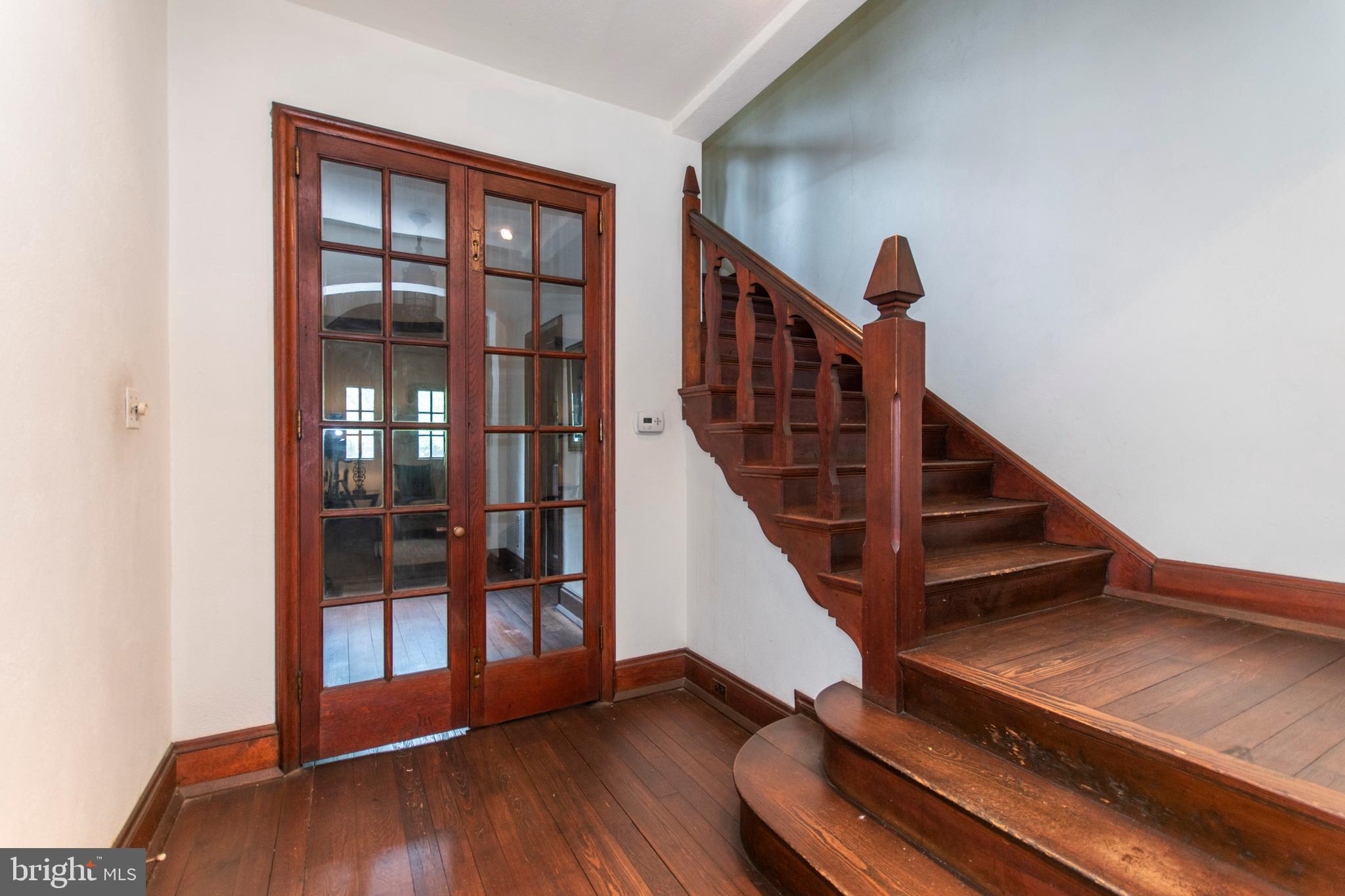 643 Washington Lane Rydal, PA 19046 - Photo 7 of 47 Original carved wood and trim detail