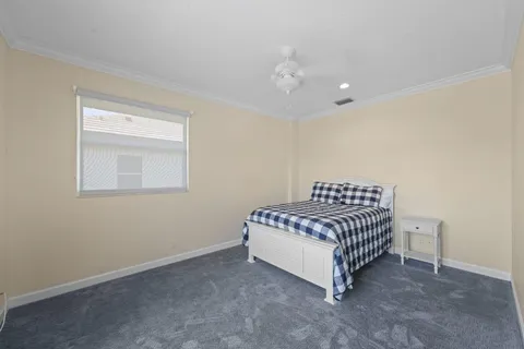 a kitchen with stainless steel appliances granite countertop a sink a stove and a microwave oven