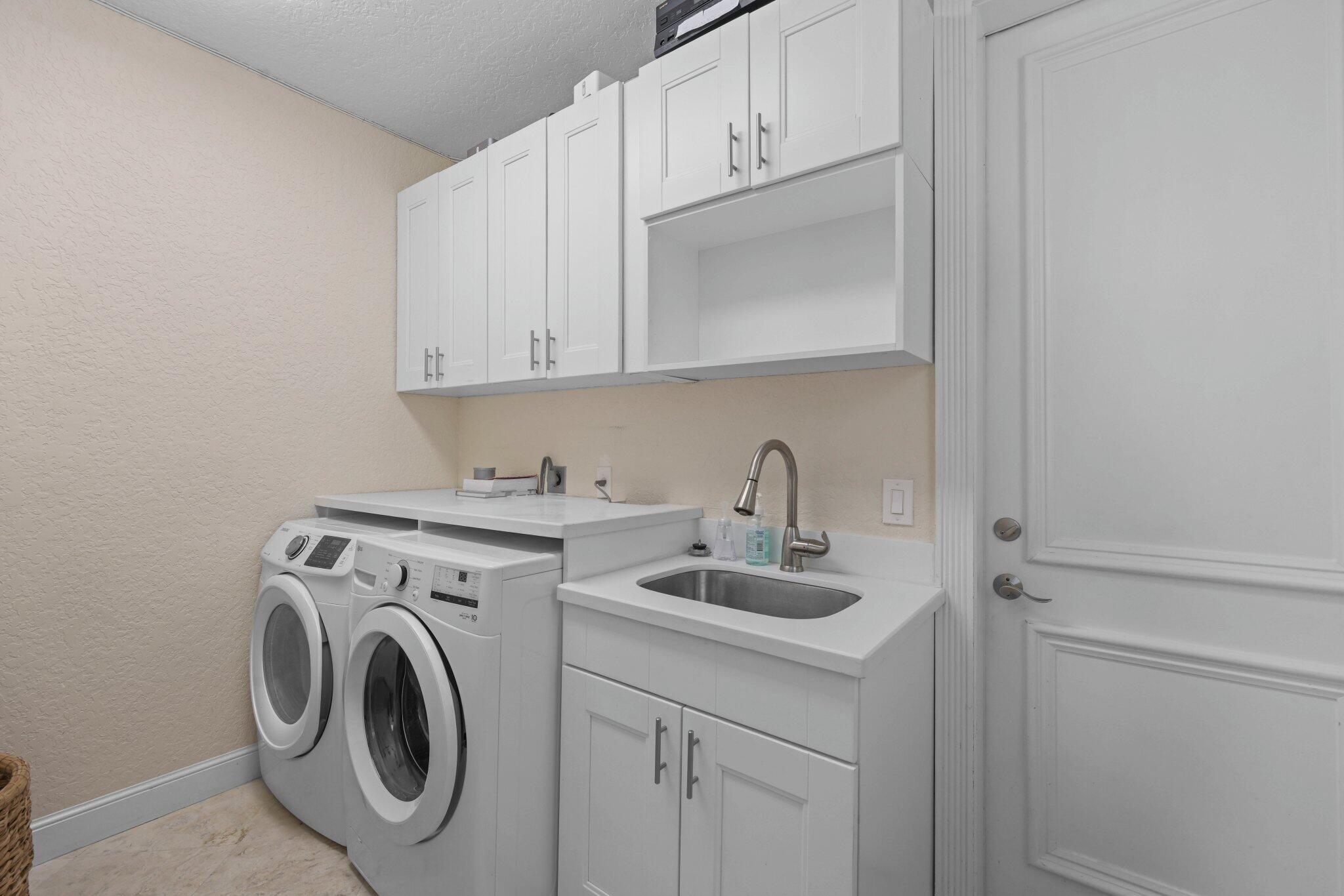 3155 Northwest 60th Street Boca Raton, FL 33496 - Photo 53 of 83 Laundry room (1st floor)