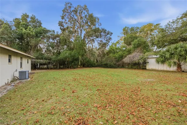 a view of a backyard with a house