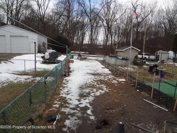 a view of room with window and a window