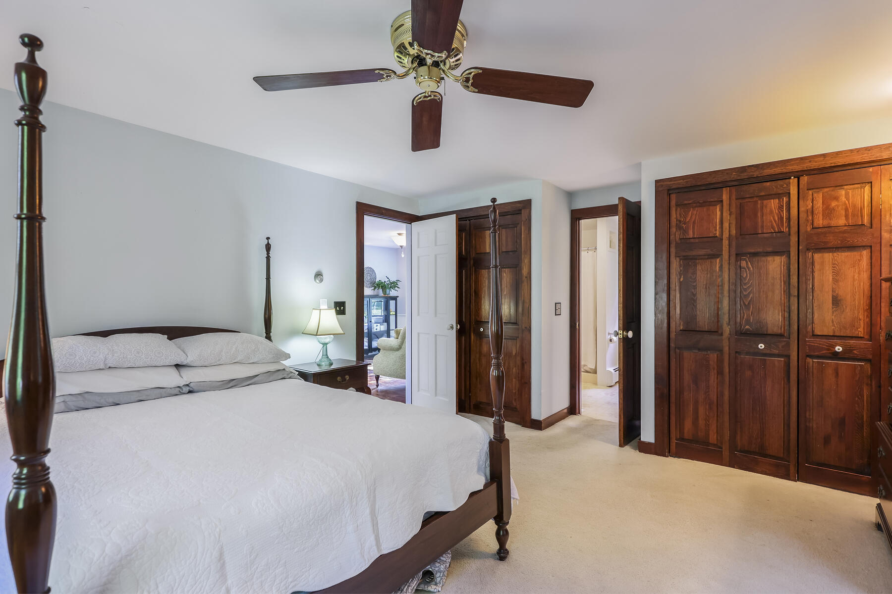 2 Greengate Road Falmouth, MA 02540 - Photo 22 of 51 a bedroom with a bed and a chandelier