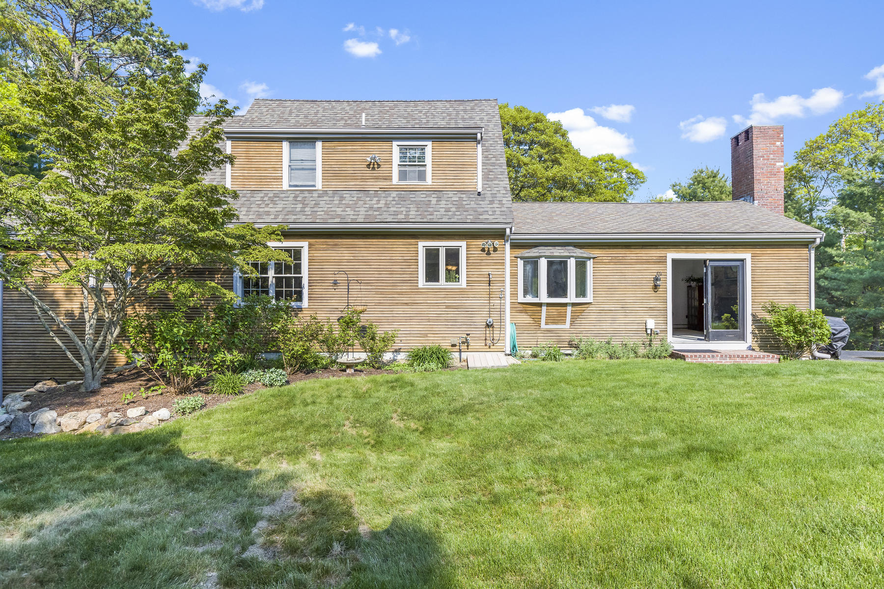 2 Greengate Road Falmouth, MA 02540 - Photo 32 of 51 a view of a house with a backyard