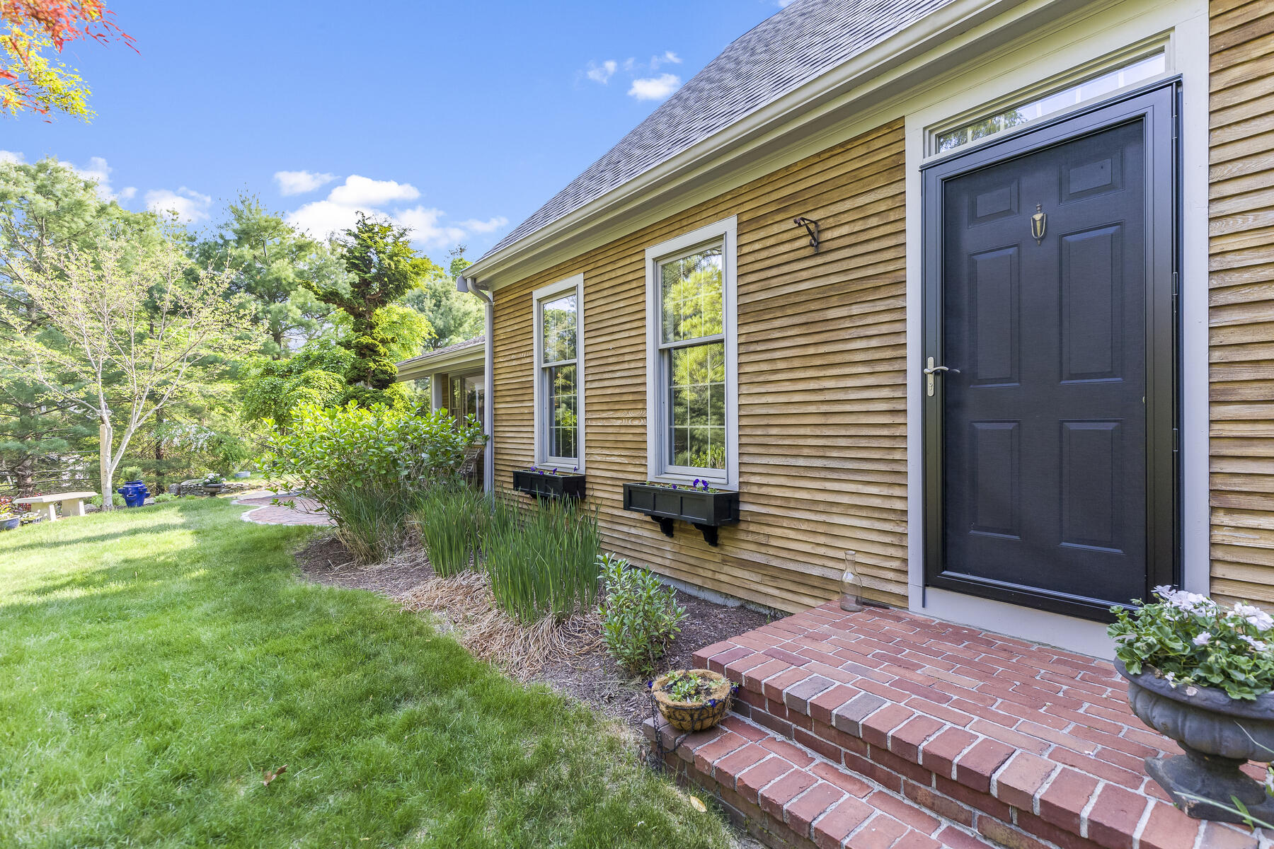 2 Greengate Road Falmouth, MA 02540 - Photo 35 of 51 a front view of a house with garden