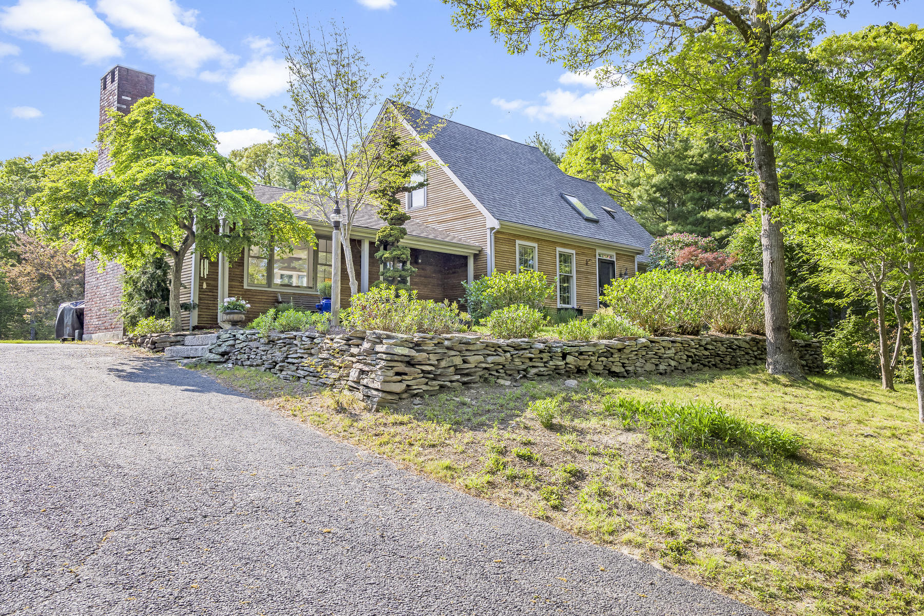 2 Greengate Road Falmouth, MA 02540 - Photo 43 of 51 a front view of house with yard and trees around