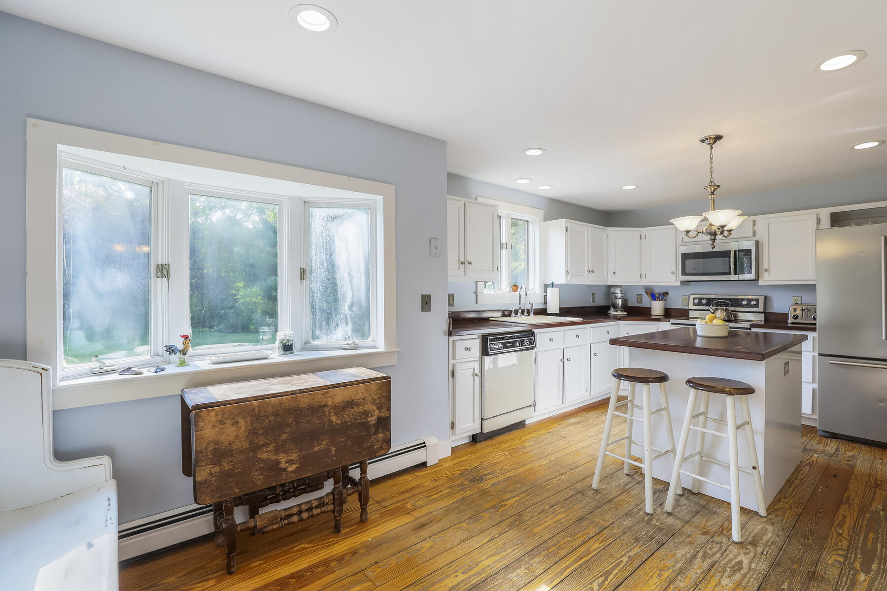 2 Greengate Road Falmouth, MA 02540 - Photo 5 of 51 a kitchen with sink cabinets and wooden floor