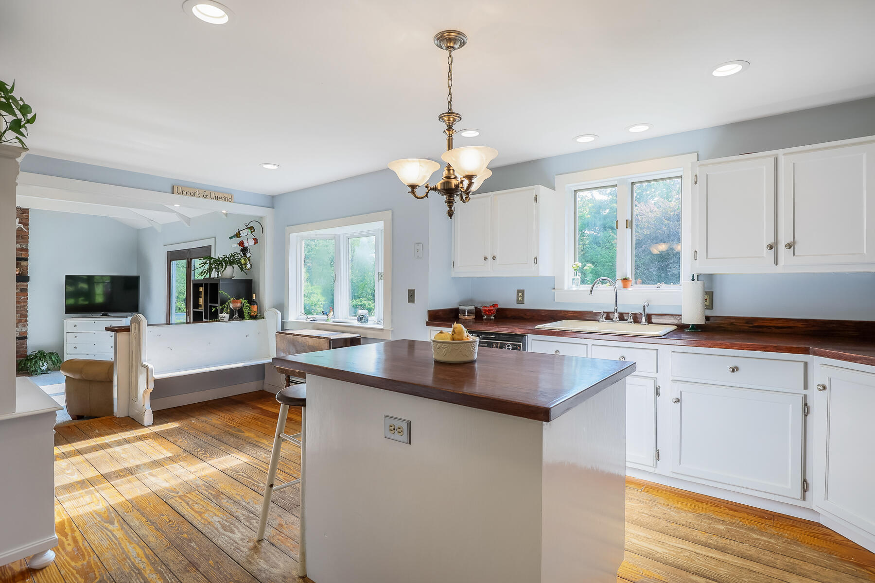 2 Greengate Road Falmouth, MA 02540 - Photo 7 of 51 a kitchen with counter top space sink and living room view