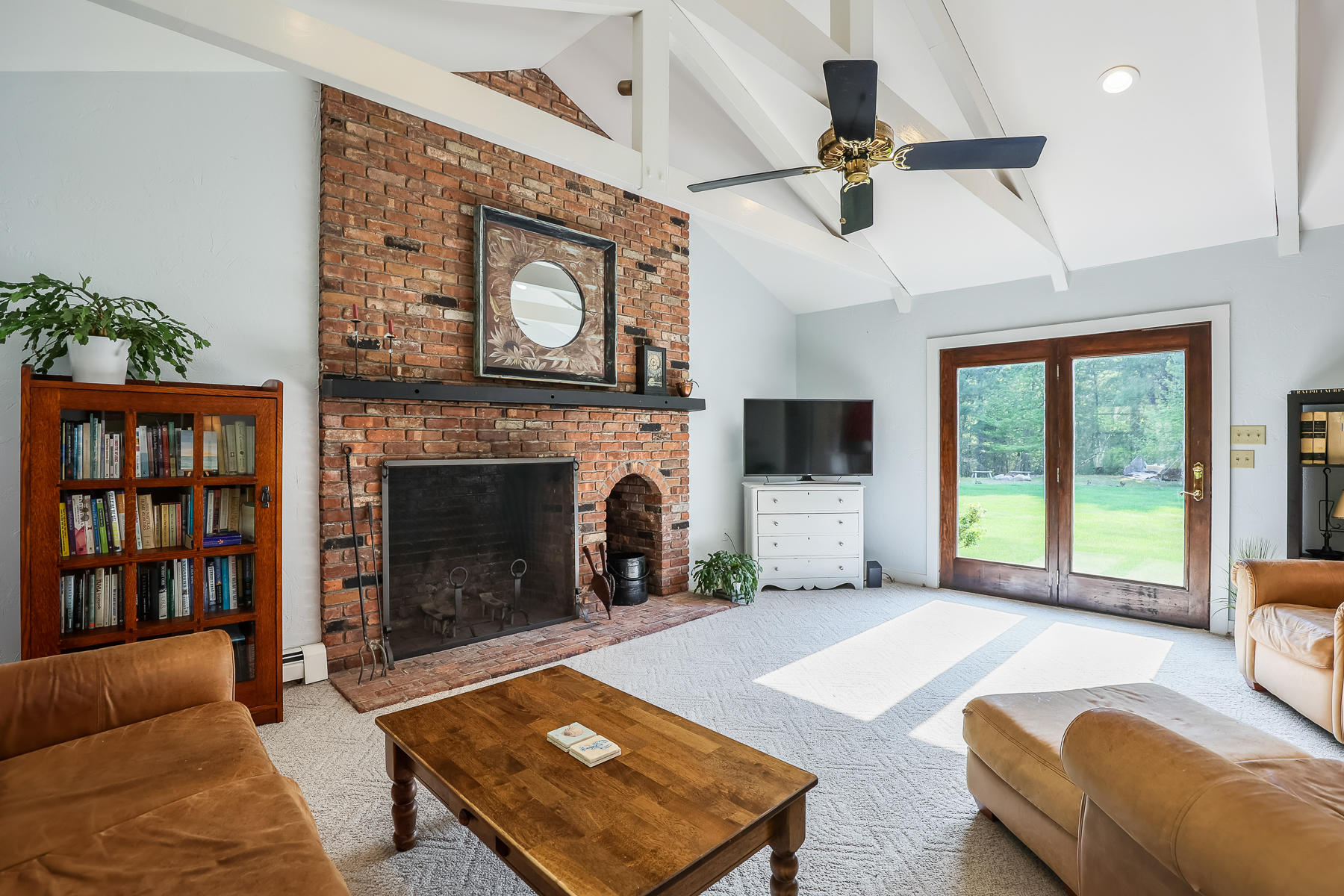 2 Greengate Road Falmouth, MA 02540 - Photo 10 of 51 a living room with furniture and a fireplace