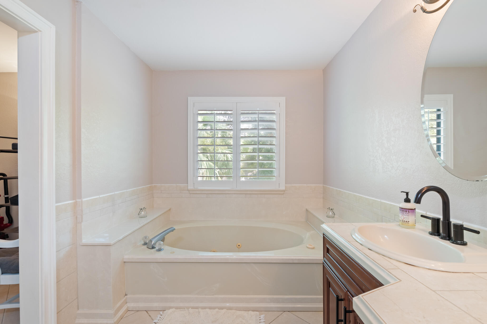 2567 Valley Road Navarre, FL 32566 - Photo 36 of 60 a white bath tub sitting next to a white sink