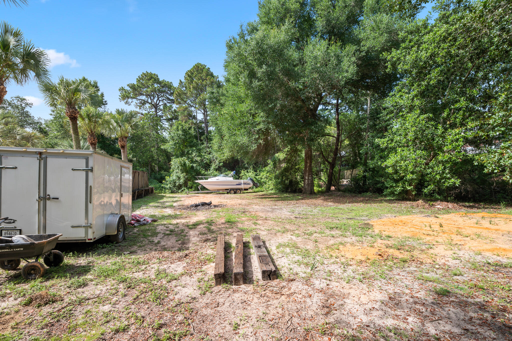 2567 Valley Road Navarre, FL 32566 - Photo 55 of 60 a view of a backyard with large trees