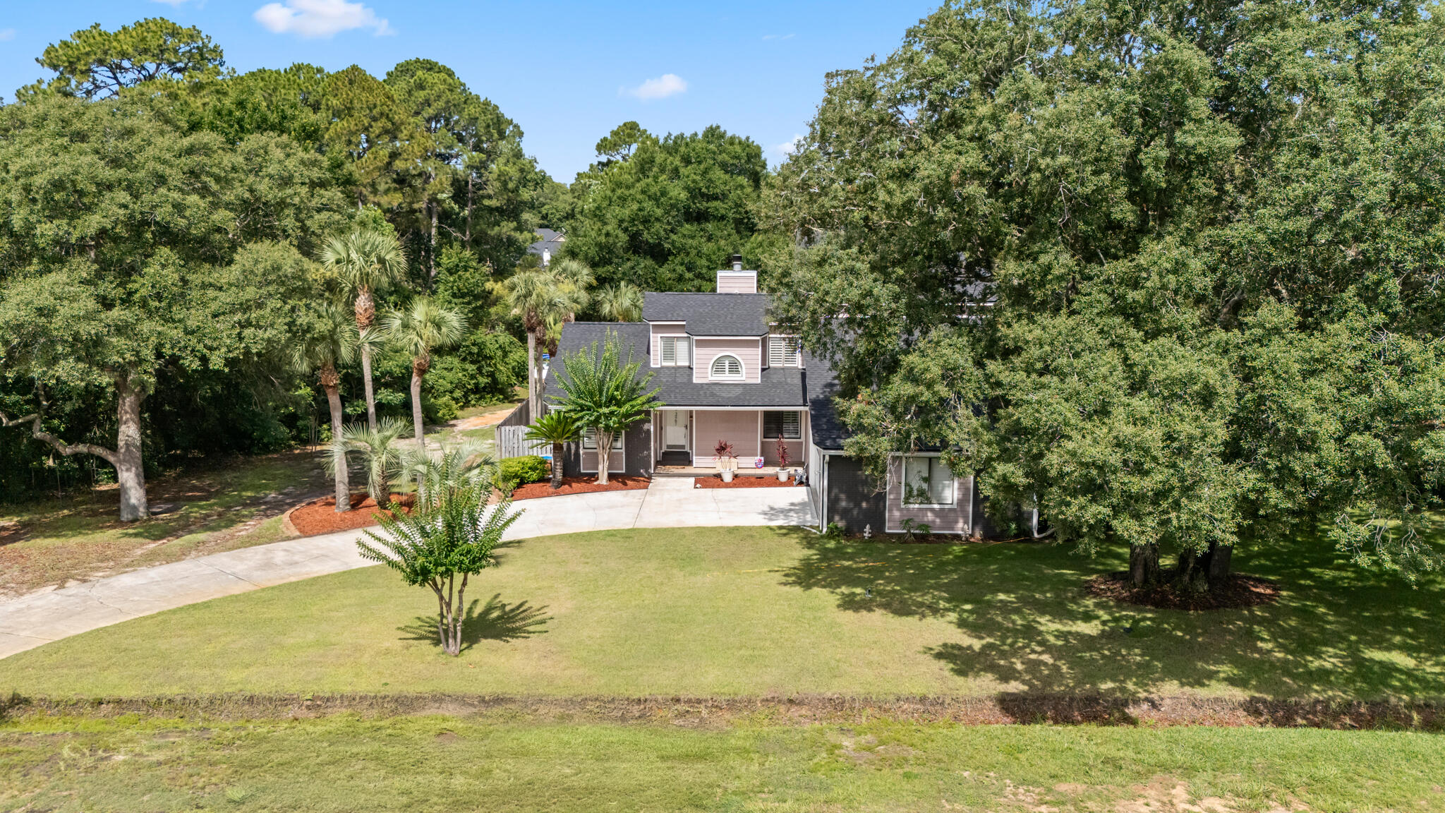 2567 Valley Road Navarre, FL 32566 - Photo 56 of 60 a view of a house with a yard
