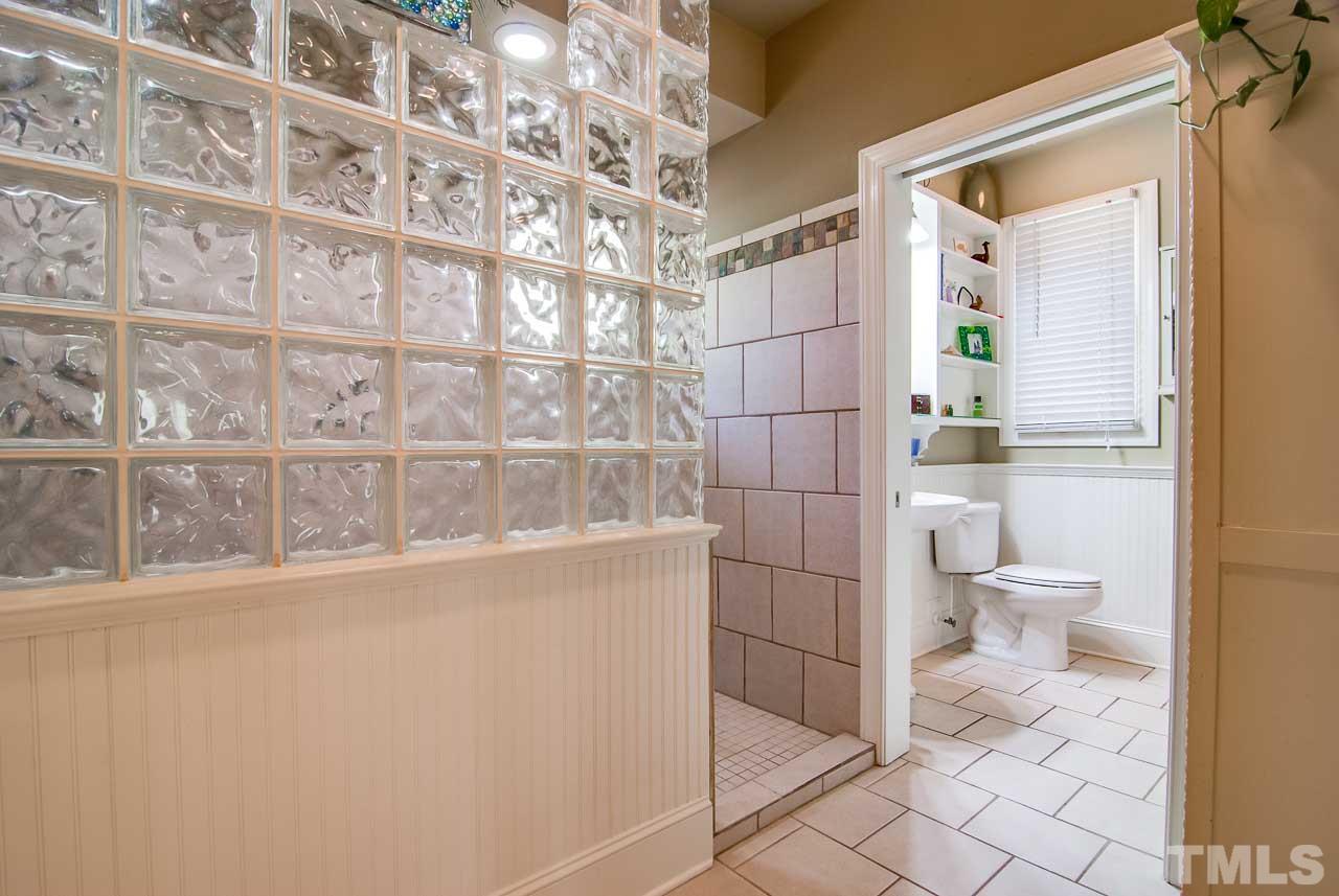 402 Bowen Road Rougemont, NC 27572 - Photo 12 of 25 a bathroom with a toilet and a shower