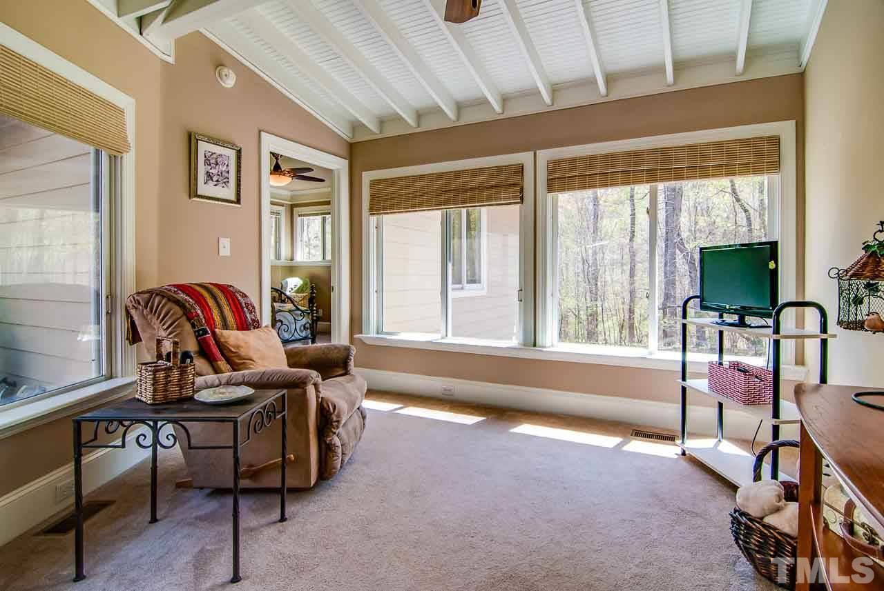 402 Bowen Road Rougemont, NC 27572 - Photo 13 of 25 a living room with furniture and a flat screen tv
