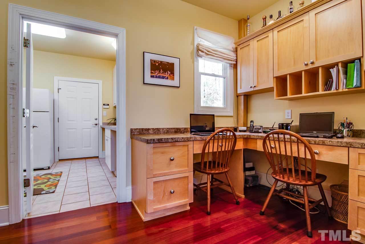 402 Bowen Road Rougemont, NC 27572 - Photo 17 of 25 a view of a workspace with furniture and wooden floor