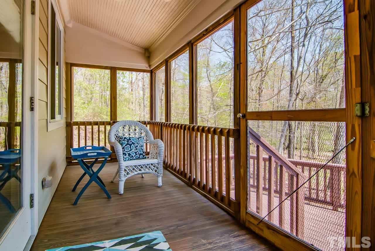402 Bowen Road Rougemont, NC 27572 - Photo 21 of 25 a view of an chairs and table in balcony with wooden floor