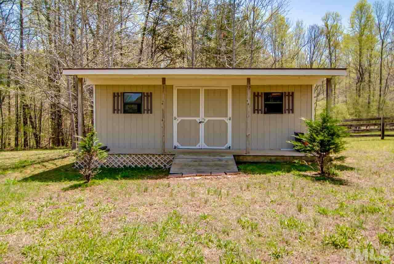402 Bowen Road Rougemont, NC 27572 - Photo 22 of 25 a view of a house with backyard and garden