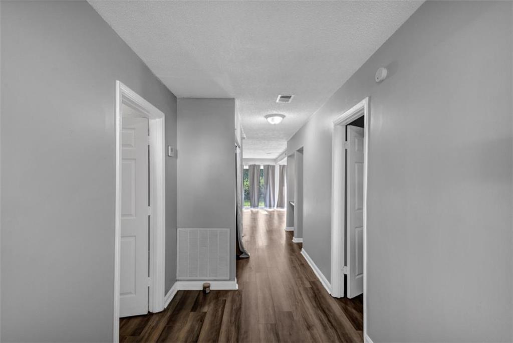 3575 Oakvale Road, Unit 504 Decatur, GA 30034 - Photo 4 of 13 a view of a hallway with wooden floor