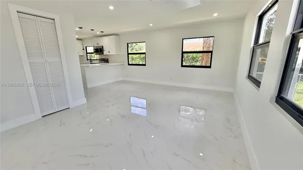 an empty room with windows