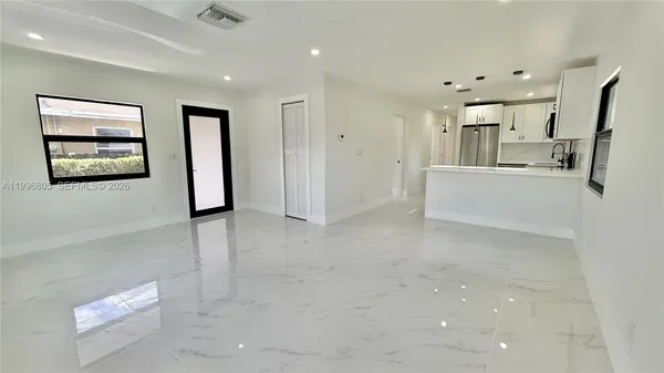 a view of an entryway with a sink
