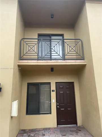 a front view of a house with a garage