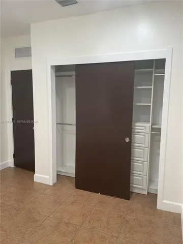 an empty room with closet