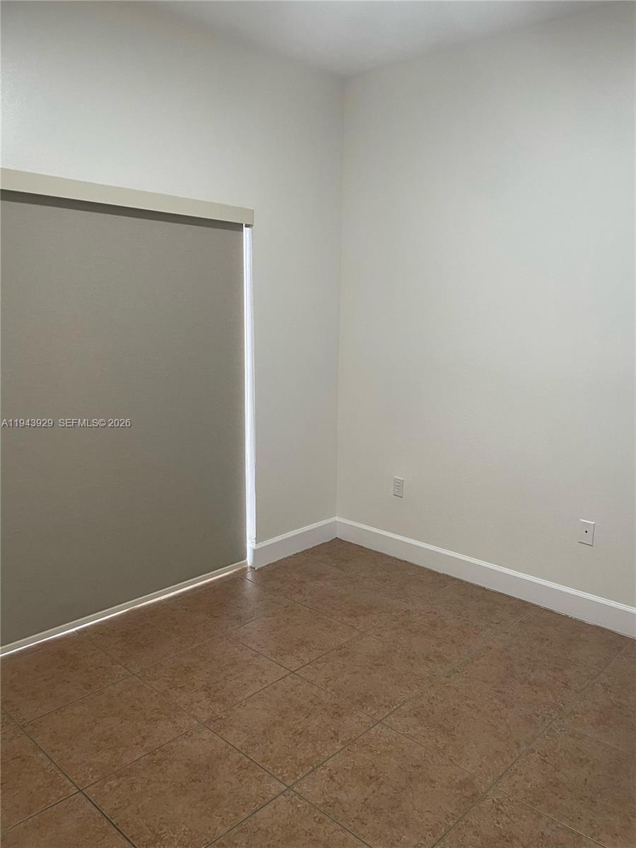 11115 West Okeechobee Road, Unit 154 Hialeah Gardens, FL 33018 - Photo 18 of 30 a view of an empty room