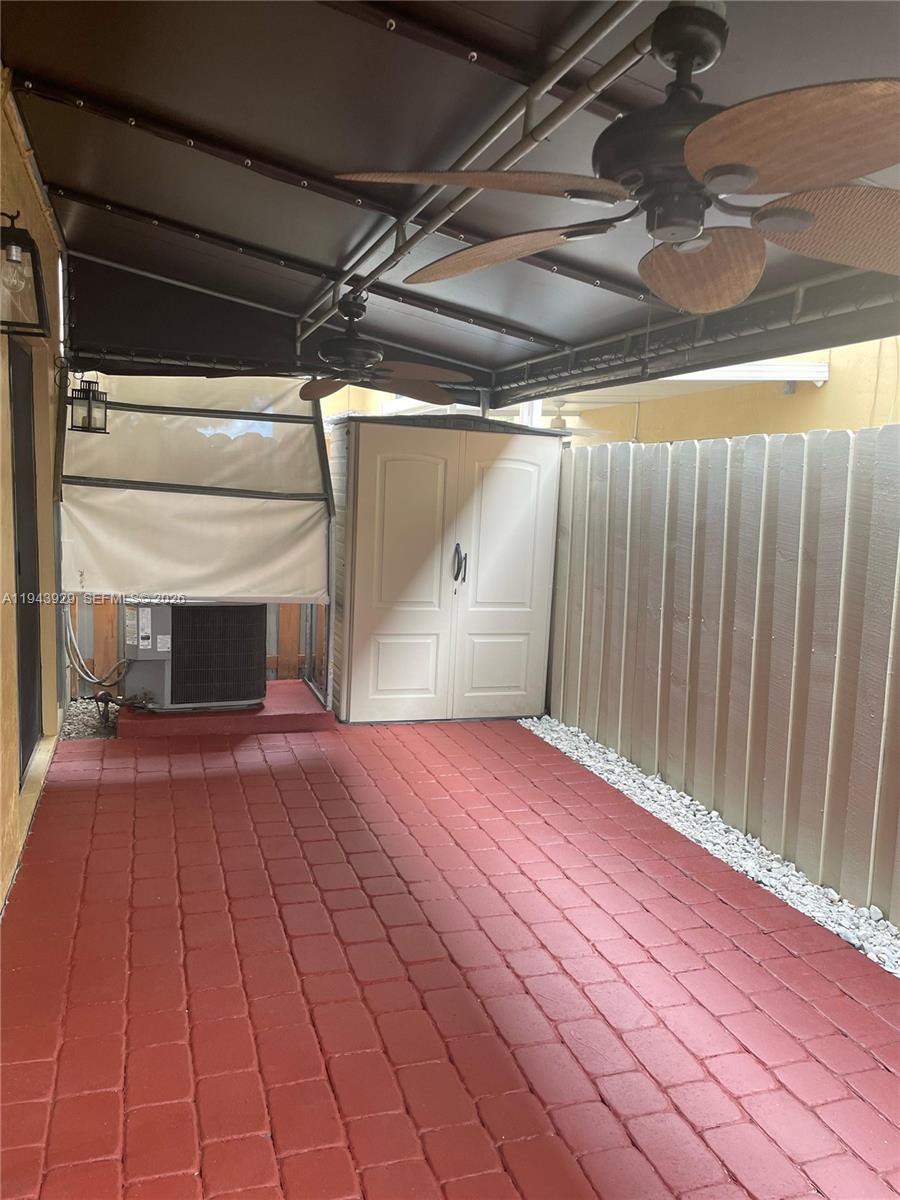 11115 West Okeechobee Road, Unit 154 Hialeah Gardens, FL 33018 - Photo 24 of 30 a view of empty room with wooden floor