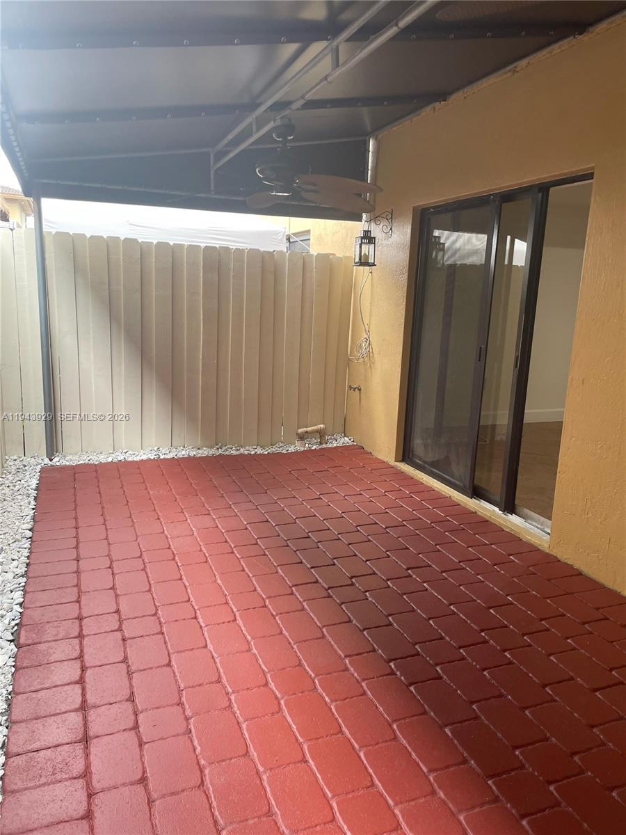 11115 West Okeechobee Road, Unit 154 Hialeah Gardens, FL 33018 - Photo 25 of 30 a view of a backyard