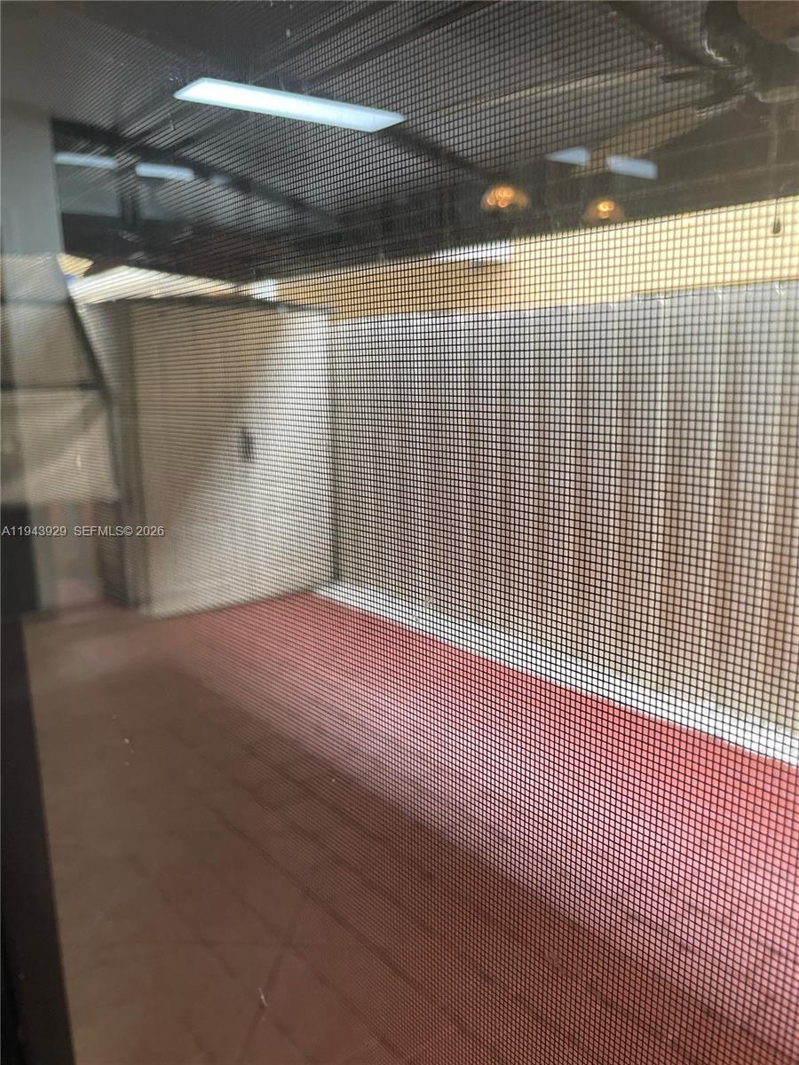 11115 West Okeechobee Road, Unit 154 Hialeah Gardens, FL 33018 - Photo 30 of 30 a view of empty room with wooden floor