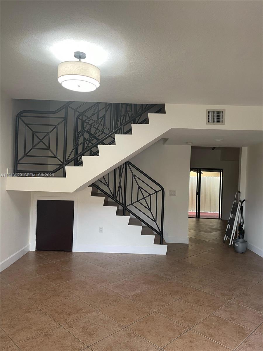 11115 West Okeechobee Road, Unit 154 Hialeah Gardens, FL 33018 - Photo 5 of 30 a view of entryway and hall