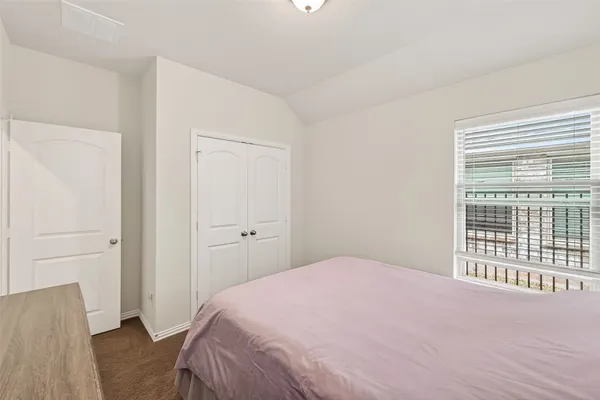 a kitchen with cabinets and appliances