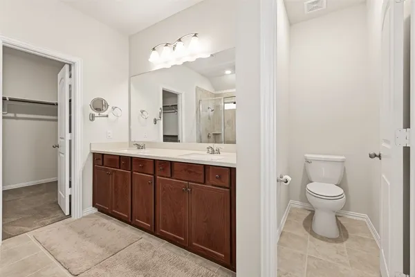 a view of an empty walk in closet