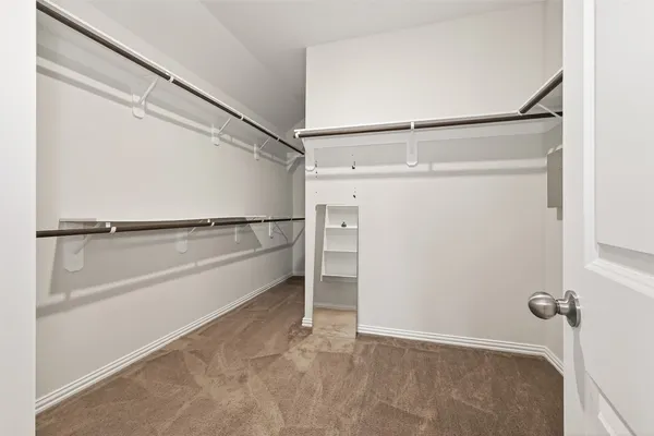 a en suite bathroom with a double sink sink and a mirror